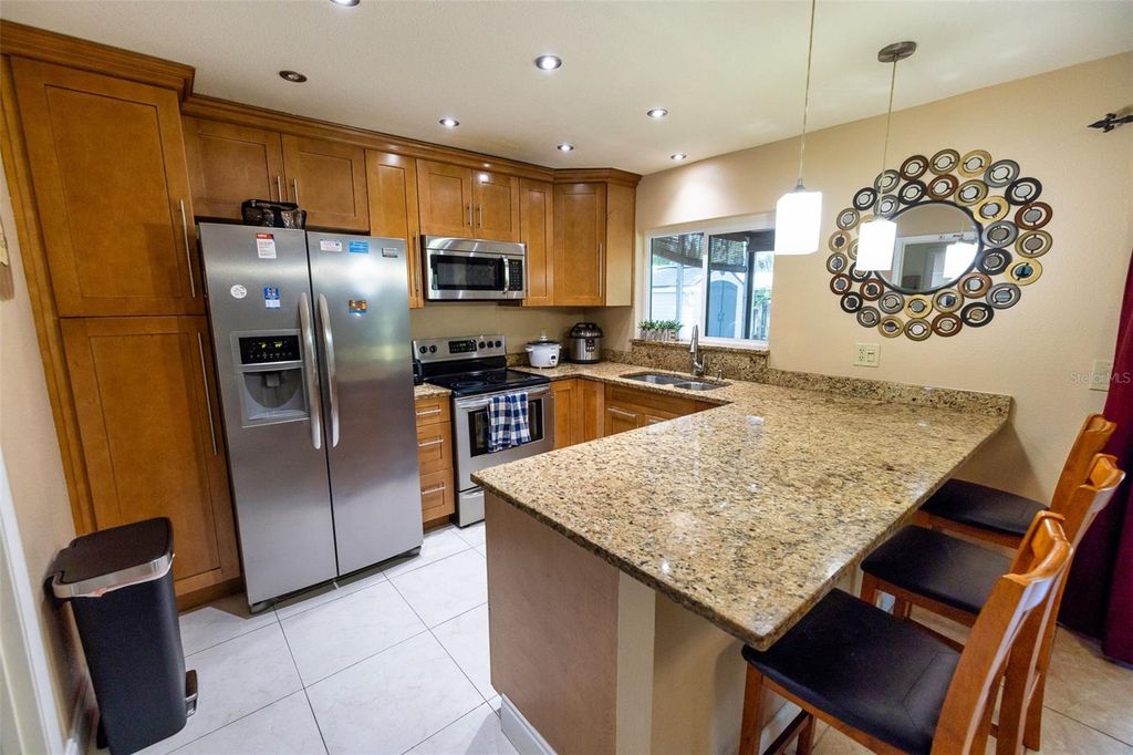 Photo of 7128 Wrenwood Circle, Tampa, FL 33617 (MLS # TB8402710)