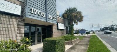 Photo of 1707 S Washington Avenue #4, Titusville, FL 32780 (MLS # O6449443)
