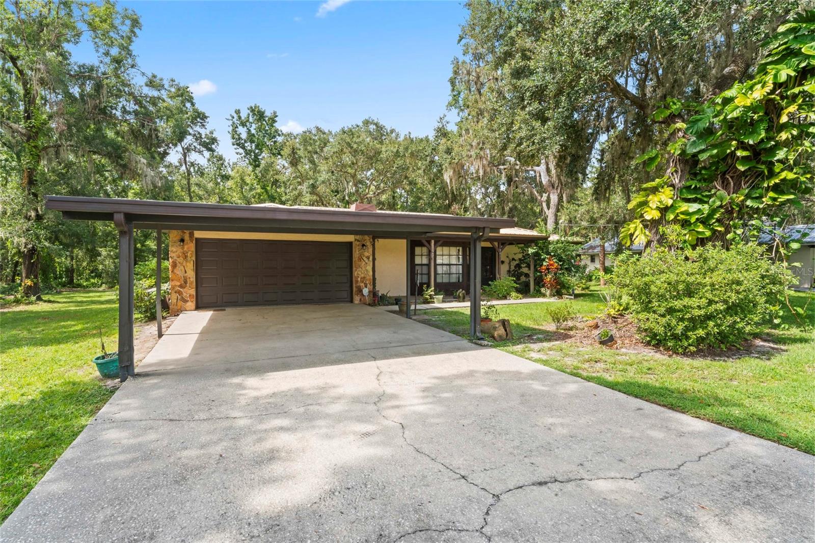 Welcome to this lovingly maintained 3-bedroom, 2-bathroom block home, custom-built by the original owner and full of timeless character. Nestled on a generous .321-acre lot in a peaceful and established neighborhood, this home offers a rare blend of privacy, charm, and convenience.
Step inside to discover a warm and inviting living space featuring a cozy fireplace, perfect for relaxing evenings at home. The thoughtful layout offers a balance of open living areas and private bedrooms, ideal for both entertaining and everyday living.
Outside, enjoy the serenity of quiet surroundings and the beauty of mature trees and a spacious yard with plenty of room to garden, play, or simply unwind. Located in the heart of Plant City, you're just minutes from local shops, restaurants, parks, and schools—yet tucked away in a tranquil setting.
Whether you're looking for a family home or a charming piece of Florida history, this property is a must-see.