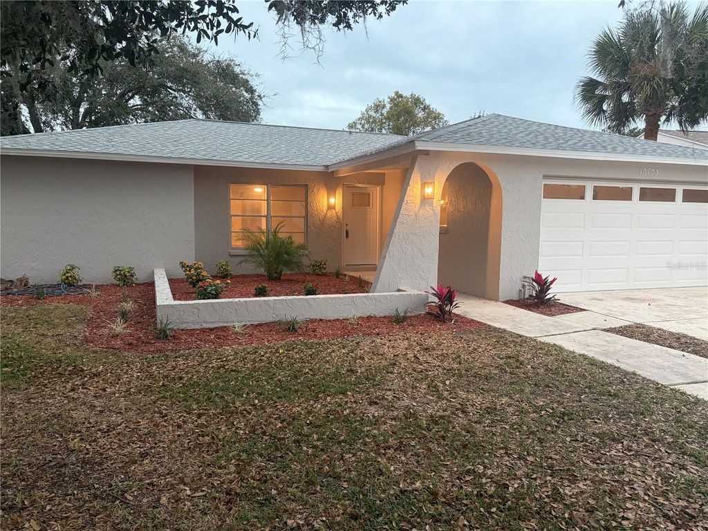 Photo of 10705 Tonapa Loop, Port Richey, FL 34668 (MLS # N6142100)