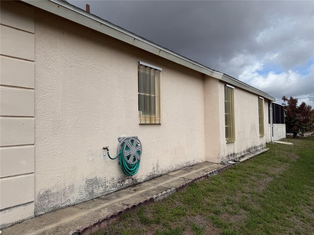 Photo of 21506 Quesada Avenue, Port Charlotte, FL 33952 (MLS # C7523251)