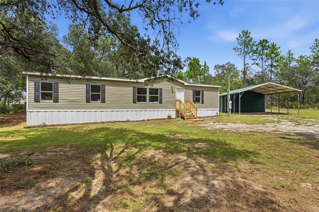 Photo of 10931 NE 78th Lane, Bronson, FL 32621 (MLS # GC542916)