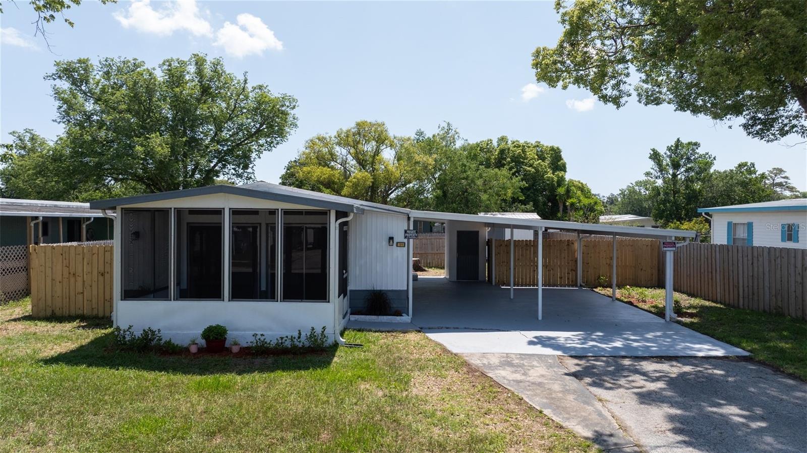 Don’t miss this fully renovated 2 bedroom, 2 bathroom manufactured home just minutes from the beach! Situated on a large lot with NO HOA and NO LOT RENT, this move-in ready home offers true ownership—you own the land!
Step inside to an open concept layout featuring new subfloors, luxury vinyl plank flooring throughout, freshly painted interiors, updated electric, and new ceiling fan. The kitchen is equipped with brand-new appliances, and one of the bathrooms features a new walk-in shower. The spacious Florida room adds even more space—perfect for relaxing or entertaining.
Outside, enjoy a metal roof, double carport, private fenced backyard, and an 8x10 storage shed for your tools, beach gear, or hobbies. There is plenty of room to add a pool.
Located just minutes from shopping, dining, healthcare, and the beach, this home offers the ultimate in convenience and flexibility. No restrictions, no fees—just easy Florida living in a fantastic location!