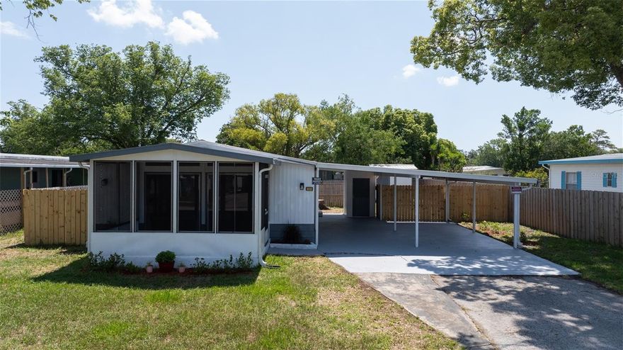 Don’t miss this fully renovated 2 bedroom, 2 bathroom manufactured home just minutes from the beach! Situated on a large lot with NO HOA and NO LOT RENT, this move-in ready home offers true ownership—you own the land!

Step inside to an open concept layout featuring new subfloors, luxury vinyl plank flooring throughout, freshly painted interiors, updated electric, and new ceiling fan. The kitchen is equipped with brand-new appliances, and one of the bathrooms features a new walk-in shower.  The spacious Florida room adds even more space—perfect for relaxing or entertaining.

Outside, enjoy a metal roof, double carport, private fenced backyard, and an 8x10 storage shed for your tools, beach gear, or hobbies.  There is plenty of room to add a pool.

Located just minutes from shopping, dining, healthcare, and the beach, this home offers the ultimate in convenience and flexibility. No restrictions, no fees—just easy Florida living in a fantastic location!