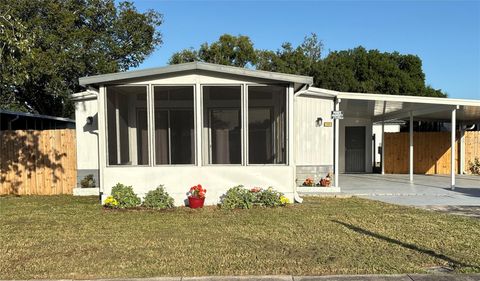 Photo of 103 Aloha Terrace, Port Orange, FL 32129 (MLS # V4942909)