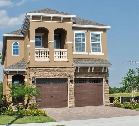 Photo of 795 Golden Bear Drive, Reunion, FL 34747 (MLS # O6375809)