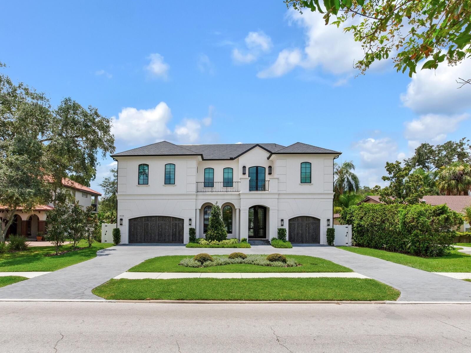 Please click the button or link for a 3-D Matterport tour of the property. (Virtual Tour #1 above)
Welcome to 4106 W Swann Avenue. This stunning new-construction home designed by Tommy Lamb and Built by Milana Homes has the quality of many $4/$5MM homes. The entrance has a soaring 2-story entryway foyer and a charming office/living room to the left of the entryway. Walk through to a magnificent 2-story family/large dining room overlooking the covered outdoor living room lanai, the expansive pool, and the turfed backyard. The family room opens to a dreamy gourmet chef’s kitchen. The kitchen is unique and hosts plenty of above and under storage and plenty of seating to entertain all around. It has a huge custom-built island with a quartz top, a farm-style porcelain sink, and custom cabinetry. The back wall houses a six-burner wolf/double oven stove framed by a stunning quartz wall (with a pot filler), and a custom wood hood. The custom cabinetry is a light wood matching the flooring throughout the home. Double subzero refrigerators and a freezer stretch across the size wall with cabinetry panels. A butler’s pantry and walk-in pantry are set off the North side of the kitchen. The home has four bedrooms and four bathrooms plus a pool bathroom. There is a bedroom and bathroom with walk-in closets and two laundry rooms, one upstairs and one downstairs. There are two additional bedrooms and bathrooms – one on the second floor in addition to the Master Bedroom and Bathroom – OH WOW. This must-see, oversized Master has cathedral ceilings and overlooks the pool from the expansive balcony. The bathroom and custom-built walk-in closets are TO DIE FOR. In addition to all of this, there is a bonus room on the second floor which could be used as a fifth bedroom. A perfectly designed home with a three-car garage in the heart of South Tampa. This home is close to the top-rated Tampa area schools, major malls & shopping, entertainment, Tampa International Airport, Downtown Tampa, Gulf beaches, and Disney World.
