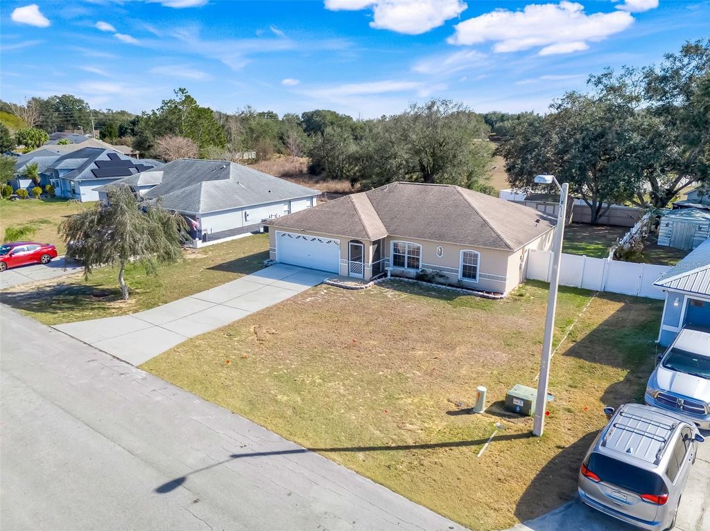 Photo of 5040 Pine Needle Drive, Mascotte, FL 34753 (MLS # G5106741)