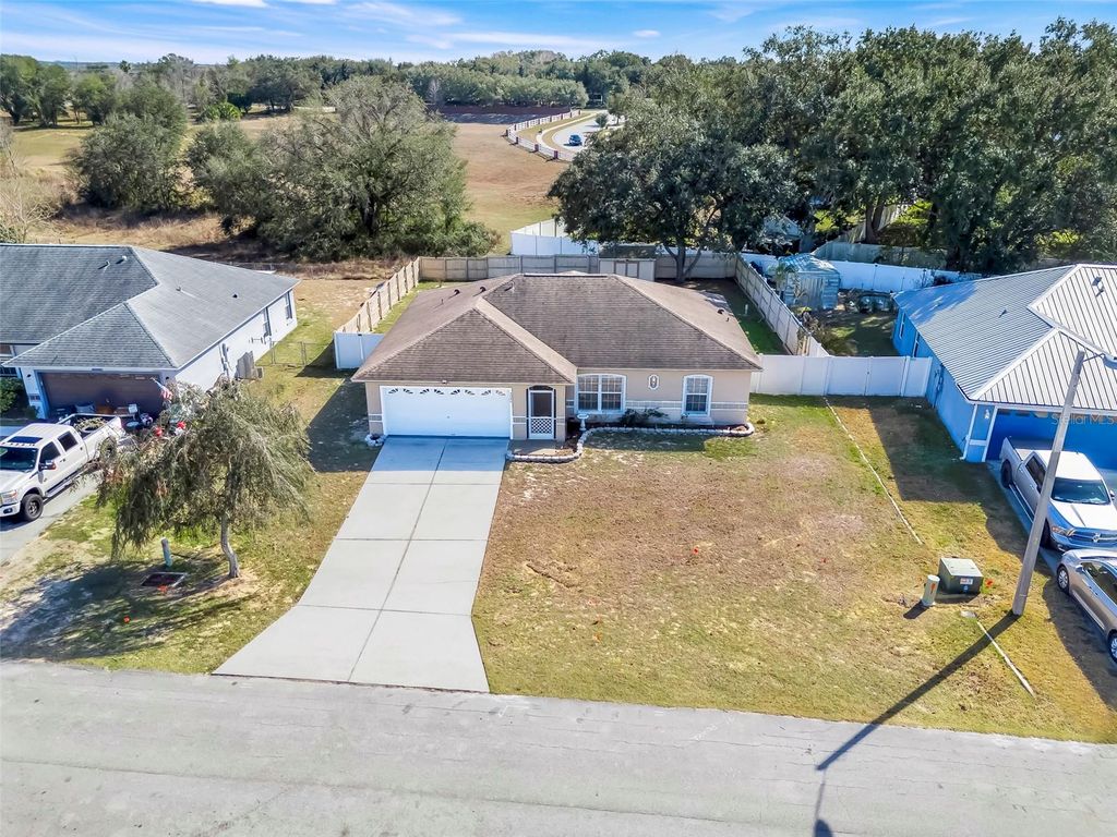 Photo of 5040 Pine Needle Drive, Mascotte, FL 34753 (MLS # G5106741)