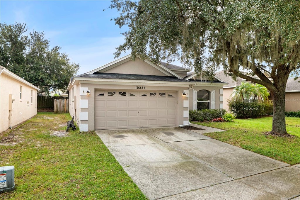 Photo of 10227 Andover Point Circle, Orlando, FL 32825 (MLS # O6447000)