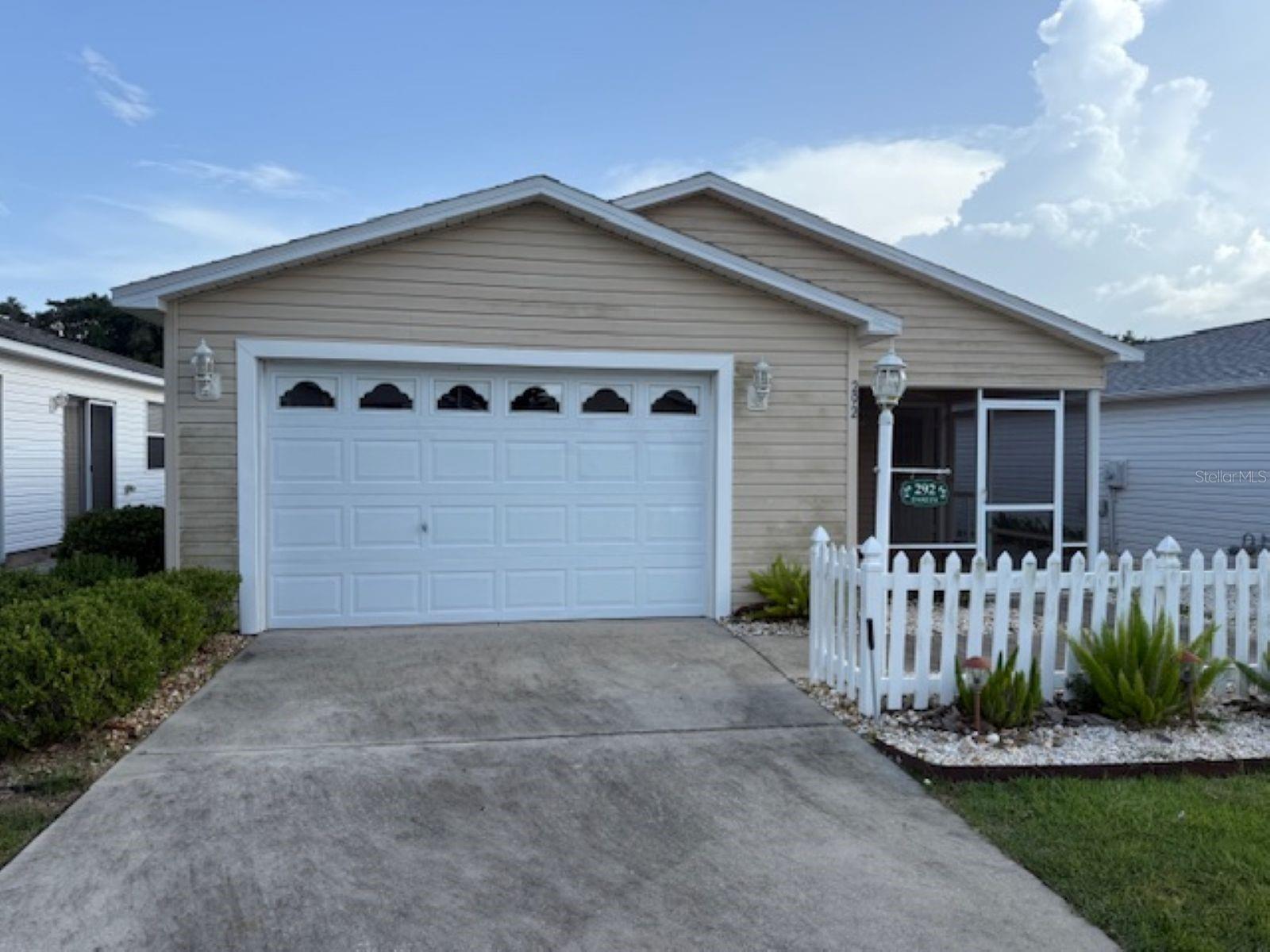 For your perrfect retirement retreat in the heart of The Villages, you can't beat this charming 2 Bd/2Ba beauty!. Step inside to find an inviting open floor plan featuring rich wood laminate flooring in the main living area providing warmth, durability and easy maintenance. The spacious living and dining areas are perfect for entertaining or relaxing after a day of enjoying all The Villages has to offer. From golf, pools and clubhouse amenities to your own little slice of paradise, this one has it all! Don't wait, this is priced to sell.