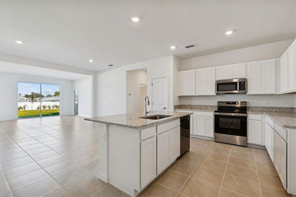 Photo of 4418 Outhaul Run, Palmetto, FL 34221 (MLS # A4690791)