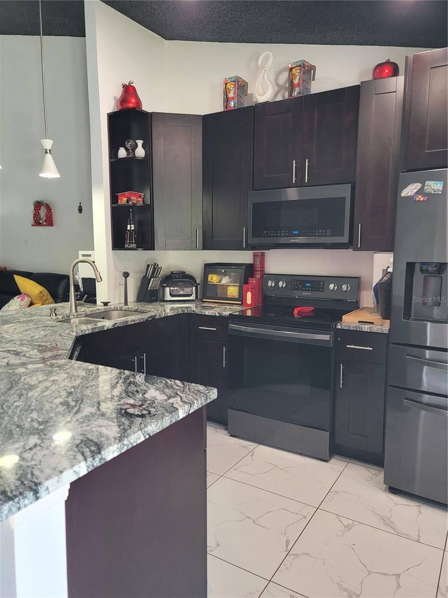 Photo of 1709 Rivers Edge Drive, Orlando, FL 32825 (MLS # O6444049)