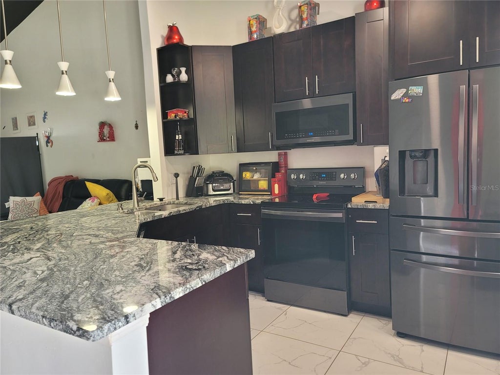 Photo of 1709 Rivers Edge Drive, Orlando, FL 32825 (MLS # O6444049)