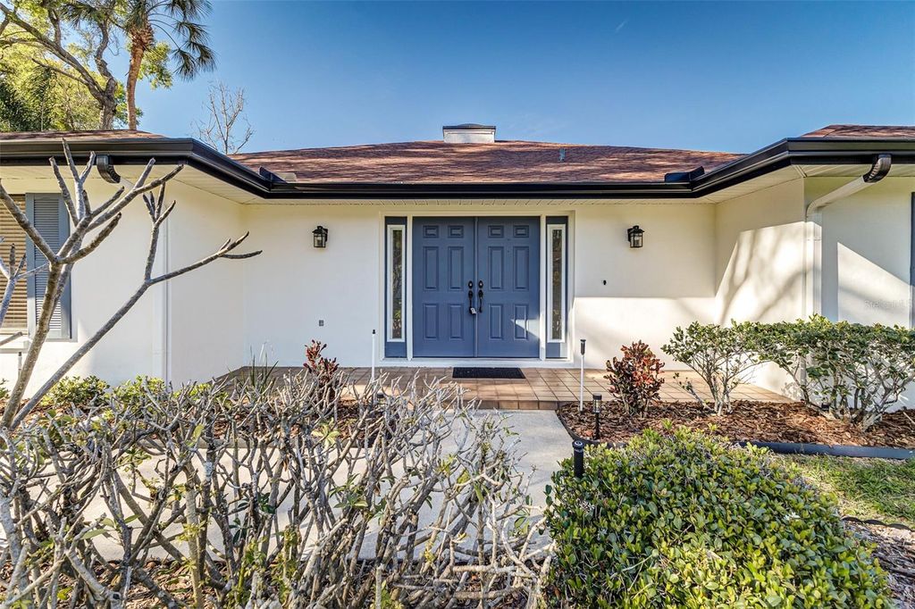 Photo of 6308 N Queensway Drive, Temple Terrace, FL 33617 (MLS # TB8488097)