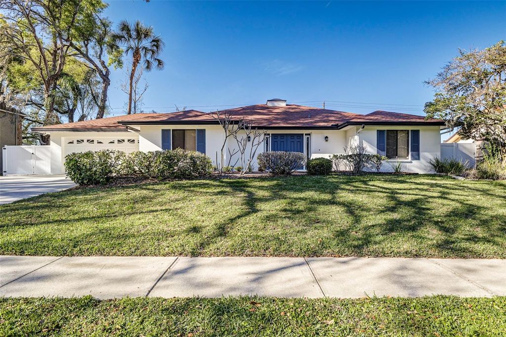 Photo of 6308 N Queensway Drive, Temple Terrace, FL 33617 (MLS # TB8488097)