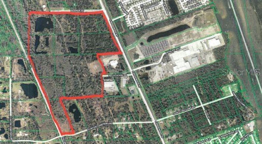 Under contract-accepting backup offers. RV Resort Development opportunity – 368 +/- RV sites! 137 +/- beautiful acres of land and small lake. Edgewater, Florida. Engineered site plans, wetland studies and surveys are completed. This is a multiparcel sale (See Exhibit A). Prime US HWY 1, Booker Street & Clinton Cemetery Road frontage. Located in City of Edgewater, in close proximity, to the Indian River and nearby public boat launches. Electric, water and gas nearby. Adjacent to Direct Marine & RV Dealership, close proximity to Boston Whaler Boat Mfg. & Magic Tilt Trailers. Approximately 8 miles south of New Smyrna Beach, FL and 30 miles north of Titusville, FL. All proposed site plans and future zoning are pending final approval. Major road ways: US Hwy 1 frontage & I95 is approximately 6.5 miles.; Cleared: Partial