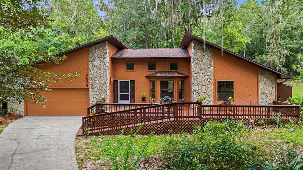 Photo of 24075 Winding Creek Drive, Brooksville, FL 34601 (MLS # TB8530373)