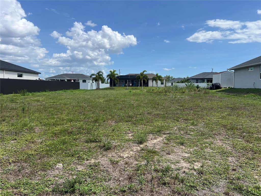 Photo of 406 Jacaranda Pkwy E Pkwy, Cape Coral, FL 33909 (MLS # S5151391)