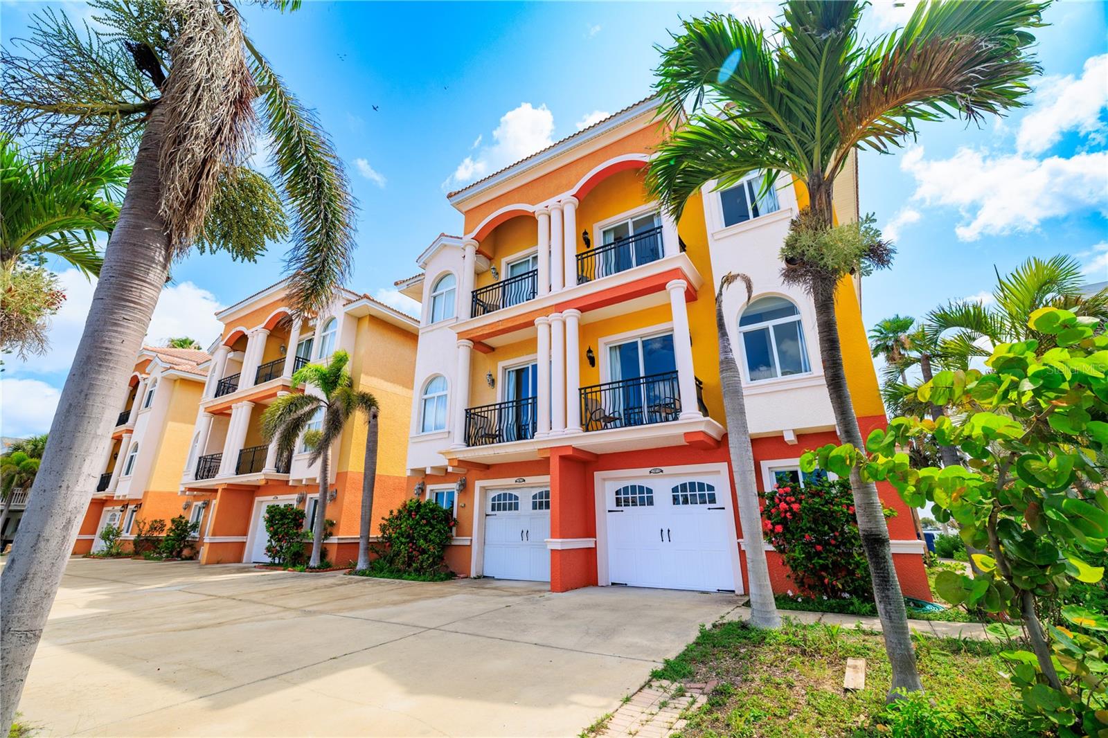 ISLAND LIVING, ELEVATED.
Welcome to your slice of paradise — a stunning 3-story townhome perfectly positioned between the tranquil Intracoastal Waterway and the warm, sugar-white sands of the Gulf of Mexico. This is Florida coastal living at its absolute finest.
Step through your private entry and you’ll find the first level offering a spacious bonus room — perfect for a home office, game room, or extra guest space — along with direct access to your oversized tandem garage, allowing room for two vehicles parked front-to-back with plenty of storage for all your beach gear, bikes, and paddleboards.
The main living spaces are thoughtfully elevated on the second and third floors — designed for peace of mind and worry-free waterfront living. On the second level, a gorgeous kitchen anchors the open-concept design, featuring high-end finishes, abundant prep space, and effortless flow for entertaining — whether you’re hosting a quiet dinner or a lively coastal gathering.
Every floor is wrapped in views. With balconies on both the front and back of the home, you’ll enjoy the best of both worlds — brilliant sunrises over the Intracoastal from your east-facing balconies (including one directly off the primary suite) and picture-perfect sunsets over the Gulf from your west-facing balconies. Four balconies in total offer endless fresh air, salt breezes, and panoramic views.
Upstairs, three generously sized bedrooms and three full bathrooms offer space for family and guests, with the primary suite serving as a private retreat complete with waterfront views, its own balcony, and spa-like ensuite bath.
Additional features include a private courtyard for outdoor dining and entertaining, a pre-plumbed elevator shaft for easy future installation, and the peace of mind that comes with elevated living in a waterfront setting.
Currently operating as a highly successful short-term rental, this property generates strong income with the current owners holding Superhost status on Airbnb — offering a rare turn-key investment opportunity with proven income history.
And the best part? You’re just steps from the warm Gulf waters, with world-class beaches, dining, shopping, and entertainment all moments away. Whether you're looking for a personal coastal retreat, an income-producing asset, or a bit of both — this one checks every box.