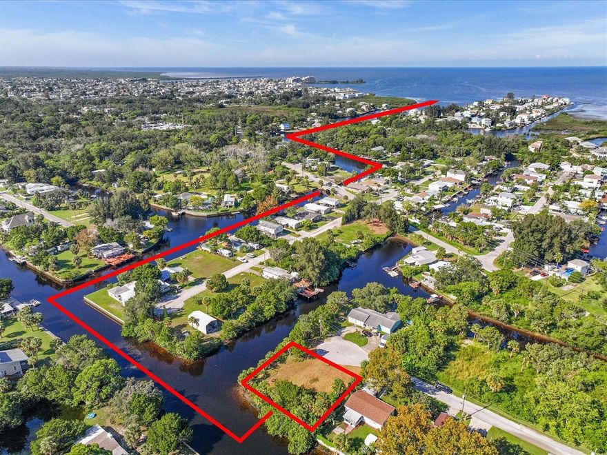 DIRECT GULF ACCESS DOUBLE LOT WITH 245 FEET OF WATERFRONT & SEAWALL!

Embrace the ultimate boating lifestyle with this rare residential opportunity in Hudson! These two combined lots offer an impressive 245 feet of prime frontage on a saltwater/spring-fed freshwater canal with a seawall already in place. Located at the end of a cul-de-sac for maximum privacy, this property provides direct Gulf of Mexico access via Cow Creek, passing beneath the higher fixed bridge at Old Dixie Highway.

A dream setting for avid anglers and boating enthusiasts alike—cast for redfish, snook, and snapper right from your backyard while watching dolphins and manatees play in the tranquil waters. With plenty of space to design your Gulf Coast Fishing Home, this double lot is a blank canvas for your coastal retreat.

Welcome to Hudson, Florida—a coastal gem just north of Tampa that feels like the Key West of the 70s. Here, the pace is easygoing, the seafood is fresh, and the Gulf of Mexico is your backyard. Hudson blends old Florida charm with modern conveniences: marinas, tiki bars, waterfront restaurants, and even a small beach for sunset gatherings. Shrimpers, stone crabbers, retirees, and free-spirited travelers alike make up this eclectic and welcoming community.

Everyday essentials are nearby along US-19, with grocery stores, banks, shopping, and major hospitals all within minutes. For bigger adventures, Tampa International Airport is just an hour away, and Disney is only 90 minutes by car.

If you’re looking for the perfect place to build your Gulf Coast Fishing Home, this double lot is a rare find—offering space, privacy, and unmatched boating access.