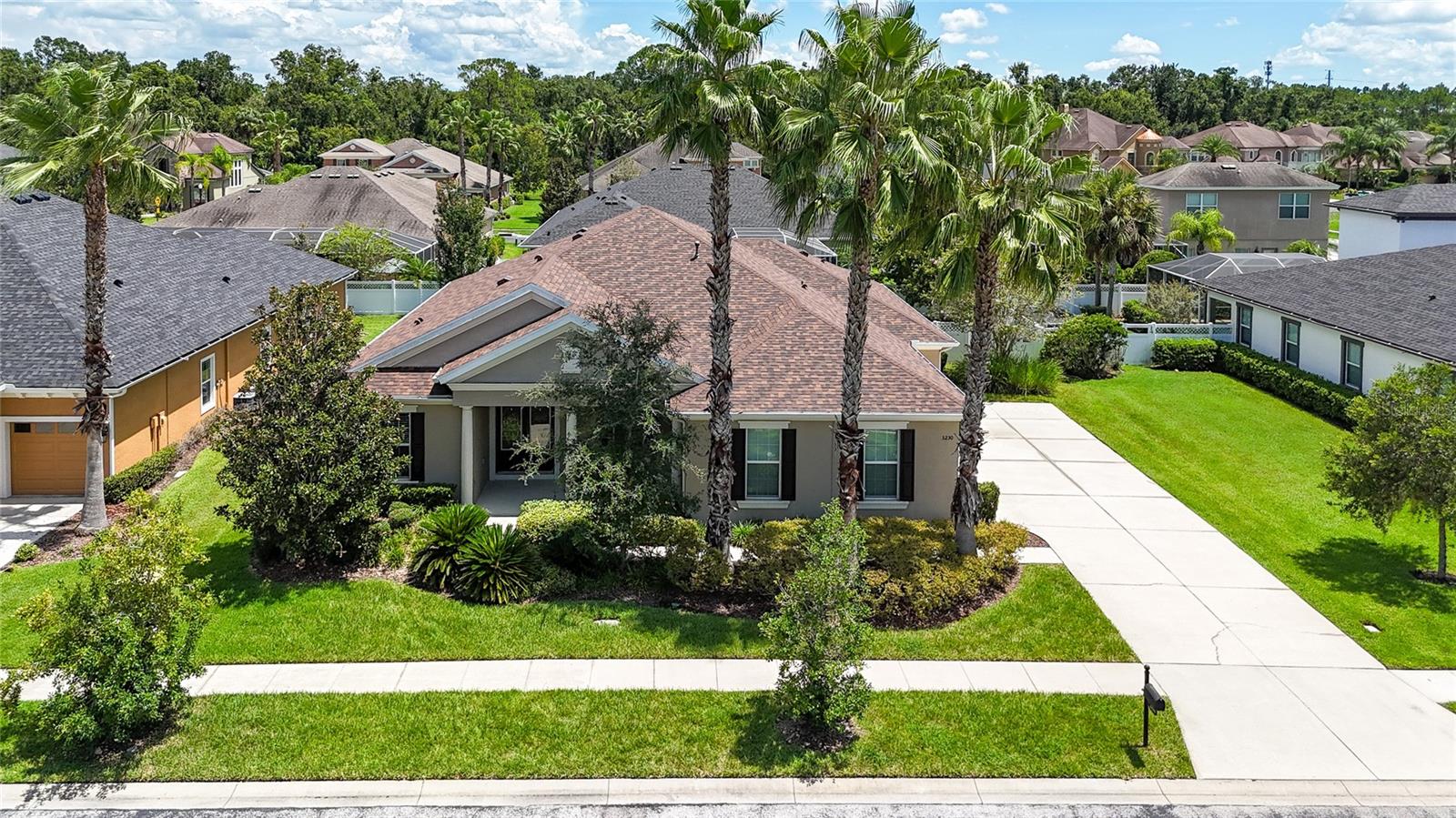 DON’T MISS THIS HOME!! Exquisite West Bay Home in the Gated Seven Oaks Community of Wesley Chapel. Welcome to your dream home in the heart of the gated Seven Oaks community! This stunning 4-bedroom, 3-bathroom West Bay residence offers the perfect blend of comfort, style, and quality craftsmanship. From the moment you step inside, you'll notice the elegant design, high-end finishes, and thoughtful layout that make this home truly special. Experience refined living in a space that’s both modern and timeless.
Step into a bright, open-concept layout with soaring 12-foot ceilings and plenty of natural light throughout. The smart split-bedroom design offers privacy and space for everyone. At the heart of the home is a gourmet kitchen that’s sure to impress, with granite countertops, 42-inch maple cabinets topped with crown molding, a gas cooktop with a sleek chimney hood, and premium stainless-steel appliances. The spacious grand room is perfect for entertaining, already pre-wired for surround sound and ready for your wall-mounted TV. Slide open the fully retractable four-panel glass doors to extend your living space onto the massive 18-by-60-foot screened lanai. With dual screen doors and built-in gas and plumbing hookups, it’s the perfect spot to add an outdoor kitchen and enjoy year-round Florida living.
The spacious master suite is very peaceful, featuring two walk-in closets outfitted with beautiful custom cherry wood cabinetry. The spa-like en suite bathroom offers a relaxing escape with a walk-in shower, a soaking garden tub beneath a privacy window, and elegant finishes throughout. All bedrooms feature real hardwood floors and custom built-in closets, no carpet anywhere, making the home both stylish and allergy friendly.
This home also offers a new roof installed in January 2025, an upgraded laundry room with built-in sink and cabinetry, granite countertops in both the kitchen and bathrooms, custom double-glass front doors with wrought-iron detailing, a dedicated study with double French glass doors, eighteen-inch tile in the main living areas, ceiling fans in every bedroom, study, living area, and lanai, a six-foot PVC privacy fence with dual gates, full-perimeter gutters, a buried propane tank in the front yard, and a raised vegetable garden bed.
Perfectly located just minutes from top-rated schools, The Shops at Wiregrass, and both Advent Health and BayCare hospitals, this home also offers quick and easy access to I-75, making your daily commute a breeze. Living in Seven Oaks means enjoying a true resort-style lifestyle, with access to a clubhouse, multiple pools, a fitness center, tennis courts, playgrounds, and scenic walking trails, all just a short drive from downtown Tampa and Tampa International Airport. This home brings together luxury, location, and lifestyle in one exceptional package. Don’t miss your chance to make it yours, schedule your private showing today!