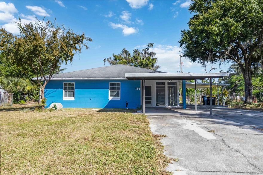Welcome to 114 Palencia Road, a meticulously updated 3-bedroom, 2-bathroom home with a 2-car carport, set on almost a quarter-acre in the Lena Vista neighborhood of Auburndale—where you’ll enjoy the freedom of no HOA and a prime, walkable location. The home makes an immediate impression with fresh exterior paint, beautiful mature trees, and inviting curb appeal. Step into the enclosed front porch featuring new epoxy flooring, perfect for enjoying your morning coffee or unwinding at the end of the day. Inside, you’ll find every inch thoughtfully renovated, beginning with a spacious living room updated with new porcelain tile flooring, fresh textured walls and ceilings, new blinds, and an open floor plan that flows seamlessly into the dining room and kitchen. The kitchen shines with brand-new stainless steel appliances, shaker-style cabinetry, and a pantry for added storage—ideal for anyone who loves to cook. The primary bedroom includes an ensuite bathroom featuring a glass-framed shower with floor-to-ceiling tile, a new vanity, a new wall cabinet, and a linen closet. Both bathrooms in the home are entirely new, with updated toilets, showers, vanities, and cabinets. Additional features include a new AC system, new interior doors, new ceiling fans, new light fixtures, and a utility room with washer and dryer hookups for added convenience. Through the side entry and carport, you’ll find the large fenced-in backyard, complete with two storage sheds that stay with the home—perfect for tools, lawn equipment, or a workshop setup. This home also boasts a fantastic location, just a short walk to the Lake Ariana Beach Clubhouse with its boat dock and ramp, amphitheater, playground, beach volleyball courts, and picnic areas. You’re minutes from downtown Auburndale’s local events, five minutes from Walmart, and just moments from the Polk Parkway and I-4 for easy travel to Orlando, Tampa, and either coast. Beautifully updated and ready for its next owner, this home is a must-see—schedule your private showing today.