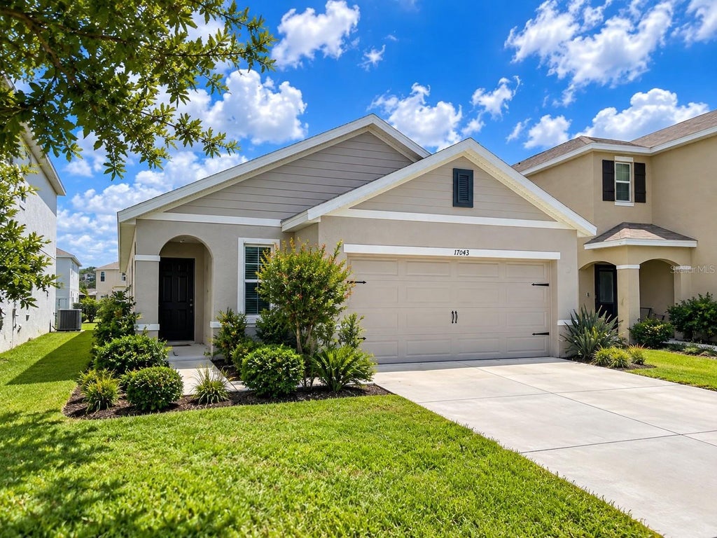 Photo of 17043 Oval Rum Drive, Wimauma, FL 33598 (MLS # O6403074)