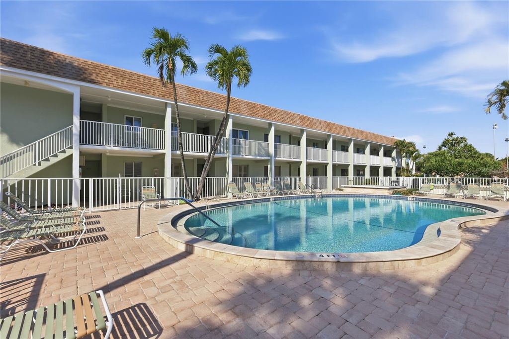 Photo of 7100 Gulf Drive #106, Holmes Beach, FL 34217 (MLS # A4673296)