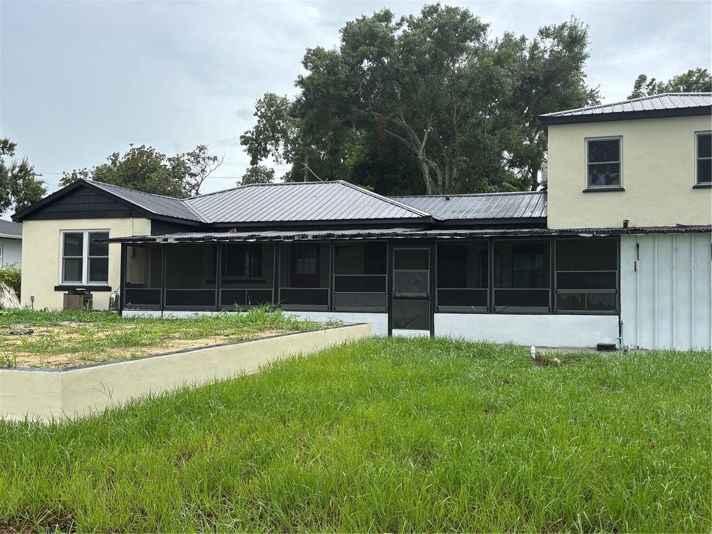 Photo of 912 Lake Jessie Drive, Winter Haven, FL 33881 (MLS # G5109288)