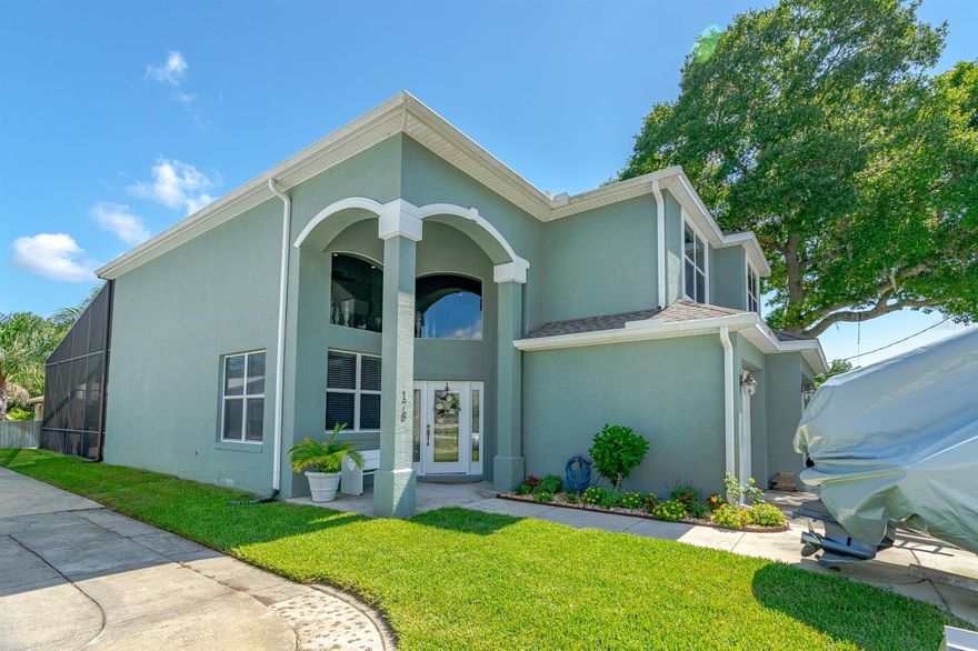 BUILDERS CUSTOM BUILT DEEP WATER CANAL FRONT HOME BUILT FOR 140MPH WINDS, CLOSE TO INDIAN RIVER AND GREAT FISHING. THIS TWO STORY HOME HAS AN OVERSIZED IN-GROUND POOL WITH SCREENING THAT EXTENDS TO THE MASTER BEDROOM BALCONY. THE IN-GROUND POOL AREA HAS A SUMMER KITCHEN AND A CONNECTING SPA/HOT TUB WITH NEW GAS HEATER - A ULTIMATE ENTERTAINMENT AREA . GRANITE COUNTERTOPS THROUGHOUT THE HOME, KITCHEN, BATHROOMS AND OUTSIDE POOL AREA. ON DEMAND HOT WATER HEATER. SITUATED ON  VERY LARGE LOT WITH LUSH TROPICAL LANDSCAPING, SPRINKLER SYSTEM AND CURBING. THIS DEEP WATER CANAL LOT HAS A NEW SEAWALL AND A LARGE BOATHOUSE TO HOLD ALL YOUR BOATING AND FISHING GEAR OR EXPAND FOR ADDITIONAL WORKING OR PLAYING SPACE. THE MASTER BEDROOM HAS A
SEPARATE READING/COMPUTER ROOM AREA WITH A LARGE BATHROOM SUITE THAT INCLUDES A GARDEN TUB AND WALK IN SHOWER WITH SEVERAL SHOWER HEADS AND A SEAT. THE WALKOUT BALCONY IN THE MASTER BEDROOM IS PEACEFUL AND PRIVATE. ALL BEDROOMS ARE LARGE. THE DOWNSTAIRS IS FAMILY FRIENDLY WITH A 1/2 BATH CLOSE TO THE KITCHEN AND FAMILY ROOM AND LAUNDRY. THE INSIDE LAUNDRY IS JUST INSIDE THE 3 CAR GARAGE FOR CONVENIENCE. THE BACKYARD OASIS IS PLANTED TO PERFECTION WITH PALM TREES AND NATIVE FOLIAGE. THE OUTDOOR PAVILION HAS CUSTOM TONGUE AND GROOVE CEILINGS WITH A METAL ROOF, RETRACTING CUSTOM SHADES, SINK, REFRIGERATOR, SURROUND SOUND AND A MULTITUDE OF ELECTRICAL OUTLETS. CANNED LIGHTING AND A WOOD BURNING FIREPLACE MAKES IT AN OOOH AND AAAAH PLACE TO BE. ENTERTAINING IS AT ITS FINEST WITH THIS STATE OF THE ART HOME. THE STURDY BOAT LIFT WILL HOLD 12,000 LBS, AND A 33 FT BOAT. BOAT HOUSE IS A SOLID CONCRETE BUNKER AND LARGE ENOUGH TO HOLD LOTS OF GEAR OR TO MAKE INTO A PRIVATE SPORTSMAN CAVE. LOTS OF EXTRAS PUT INTO THIS CUSTOM BUILT CANAL FRONT HOME THAT MAKES IT THE PERFECT SPOT TO CALL HOME. NEW OVERSIZED 5 TON HEAT AND AIR INSTALLED LESS THAN 6 MONTHS AGO WITH A 10 YEAR WARRANTY. ;Water: City