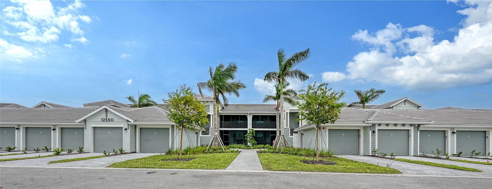 Stunning second floor 2-bedroom 2-bathroom condo with a den has stunning view of the fairway! This turnkey property has been professionally decorated with chic modern flair and upgrades galore which include a custom back splash and a built-in bar with wine refrigerator and upgraded lighting. Enjoy gorgeous sunny days and cross breezes on your very own front and back lanai. Functional open floor plan lends itself to Florida style living and entertaining. Nicely appointed kitchen boasts stainless steel appliances and granite counter tops. Master has king size bed and ensuite bathroom with double sinks and large tile walk in shower. Plenty of room for guests and family. Queen bed in the second bedroom. Third flex room has a pull-out sofa with a desk for additional sleeping quarters or working space. Separate detached 1 car garage for your car, golf clubs and beach gear. Entertain guests and enjoy meals as you watch the golfers navigate this new 18-hole Gordon Lewis designed course from your very own lanai! Amenities include TIKI BAR/RESTAURANT, FITNESS CENTER, RESORT STYLE SWIMMING POOL, POOLSIDE SERVICE, THREE SATELLITE POOLS, TENNIS COURTS, PICKLE BALL, BOCCE BALL AND MORE! Golf membership transfer available for purchase. $65.00 monthly minimum expenditure is required at the on-site Tiki- Bar/Restaurant (Alcohol Excluded). Easy access to I-75, downtown Wellen Park, Atlanta Braves Training stadium and local shopping and dining, minutes to Gulf Beaches and all Wellen Park has to offer. ***HIGH SEASON (DEC-APRIL) RATE~ $6,500.00 PER MONTH*** LOW SEASON (MAY-NOV.)