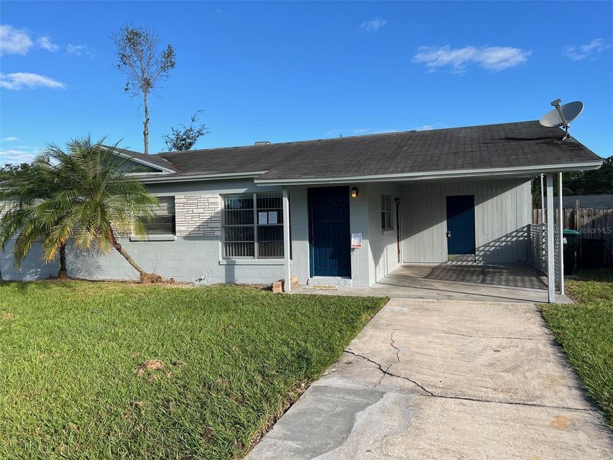 This affordable, cozy 3/1 is clean with fresh paint in and out.  No scam worries with the same local owner/manager since 1985.  The price reflects the "dated" condition.  Newer refrigerator, & built-in microwave above the glass-top stove. Small screened patio and storage shed in the back.  Bathroom features a new vanity with granite counter that extend above the toilet for more space. Large storage room at the back of the carport houses laundry hookups.  The living floor areas are tiled and the bedrooms each have new, neutral-color carpeting.  All bedrooms & living room have ceiling fans. Local owner is in Oviedo and keeps home well maintained.  Renter is responsible for lawn maintenance. This is a quiet street is a short distance to Bonneville Elem.  Close to shopping and Research Park and East Orange employers.  Easy access to Hwy 408.