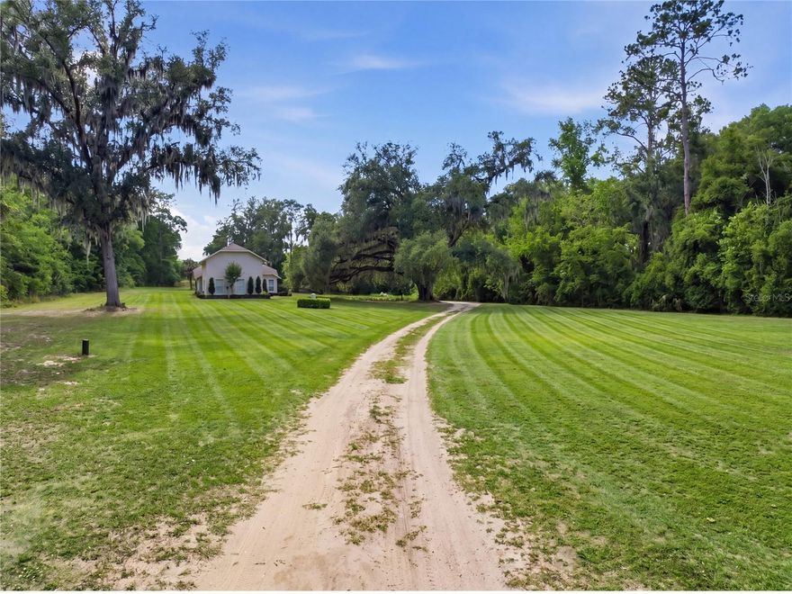 (INTERIOR/AERIAL/EXTERIOR PICTURES WILL BE UPDATED SOON) Nestled on 3.04 acres in the desirable SE Ocala area, this versatile agricultural property offers the perfect blend of space, functionality, and opportunity. Zoned A-1, the property is ideal for those looking to create a mini farm, bring animals, or enjoy the freedom of country living with no HOA restrictions.

The main residence features 3 bedrooms and 2 bathrooms, complemented by an attached 1 bedroom, 1 bathroom in-law suite with its own kitchen and private living space. This flexible layout is perfect for multi-generational living, guest accommodations, or potential rental income.

With a total of 2,966 square feet, the home provides ample room to live comfortably while enjoying the privacy and openness that acreage living offers. Built in 1994, the property has undergone extensive updates since 2021, including a new roof (2021), updated well system, oversized drain field, new A/C unit (2025), fresh interior and exterior paint, stucco exterior, and full landscaping. Interior improvements include LVP flooring throughout most of the main home, an updated kitchen with granite countertops, new sink, faucet, glass backsplash, and hardware, along with upgraded bathrooms featuring new cabinetry, fixtures, and finishes. Additional enhancements include new appliances, lighting, exterior doors, and a block wall courtyard separating the main home and in-law suite.

Surrounded by larger parcels under common ownership, the property offers added privacy and a peaceful setting. Conveniently located approximately 25 minutes from the World Equestrian Center and HITS Ocala, this property is well-positioned for equestrian enthusiasts or those seeking proximity to Ocala’s premier horse venues.

Whether you are looking to establish a mini farm, invest in an income-producing setup, or simply enjoy the benefits of rural living with close access to town, this property offers exceptional potential.

Furniture and equipment may be available separately.