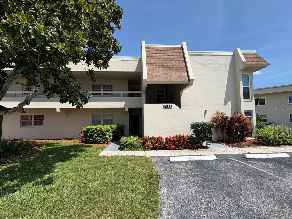 Photo of 7153 W Country Club Dr N #145, Sarasota, FL 34243 (MLS # A4698478)