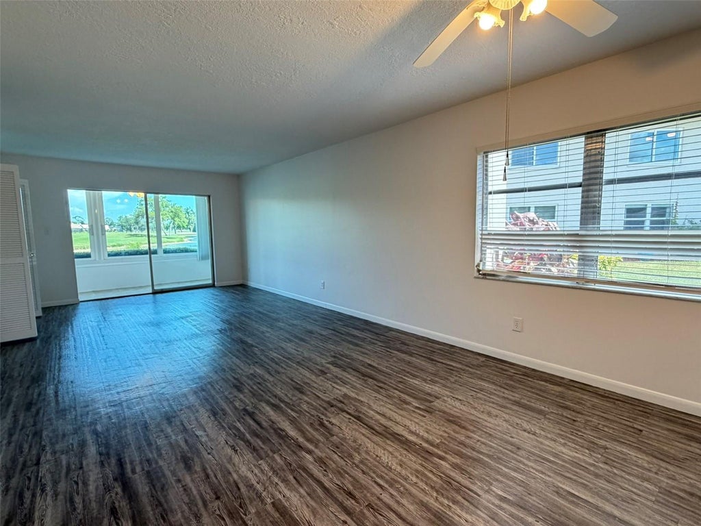 Photo of 7153 W Country Club Dr N #145, Sarasota, FL 34243 (MLS # A4698478)
