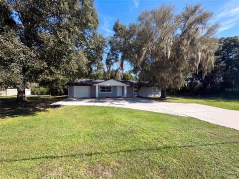 Photo of 425 W Daughtery Road, Lakeland, FL 33809 (MLS # O6450201)
