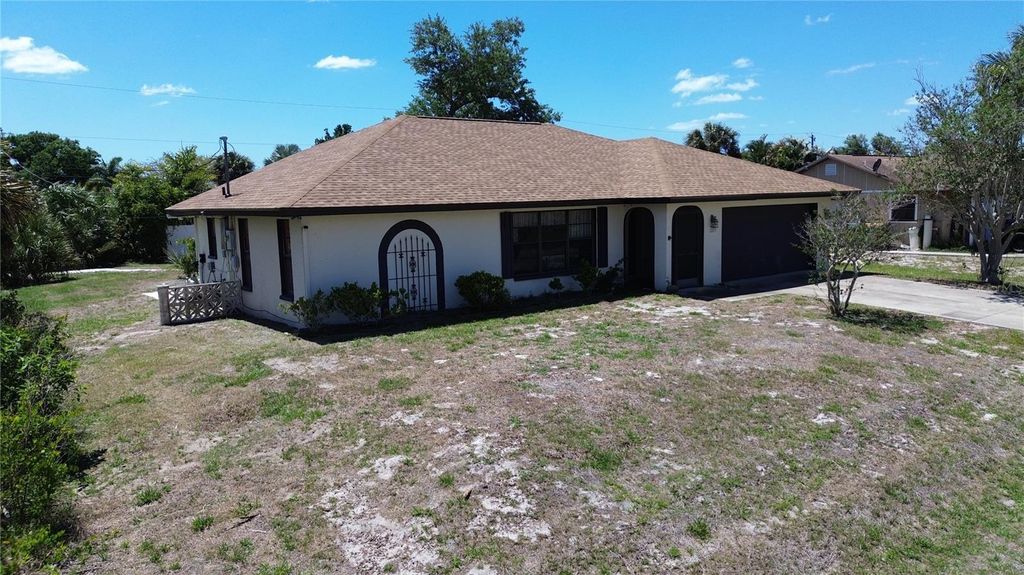 Photo of 7273 Bridgeport Lane, Englewood, FL 34224 (MLS # D6147011)