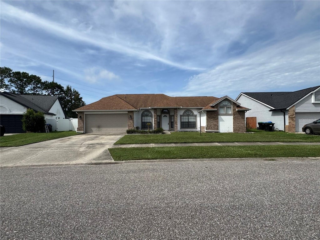 Photo of 12745 Newfield Drive S, Orlando, FL 32837 (MLS # O6441011)