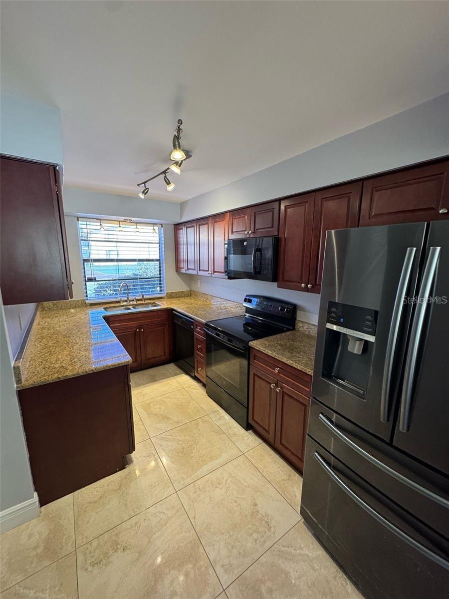 Photo of 7517 Camarina Calle, Tampa, FL 33615 (MLS # TB8555428)