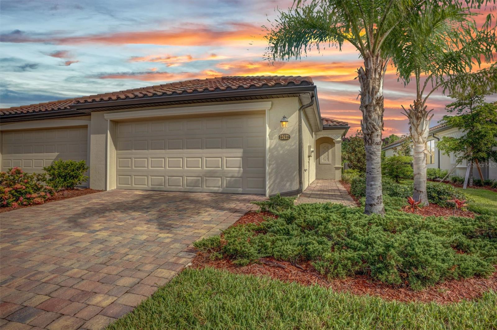 Welcome to this beautifully maintained 2-bedroom, 2-bath villa with a den, located in the highly sought-after gated community of Gran Paradiso in Venice, Florida. Built in 2005, this elegant home blends comfort, style, and peace of mind in one of the area’s premier resort-style neighborhoods.
From the moment you arrive, you're greeted by a brick paver driveway and entryway that enhance the home's curb appeal. Inside, you'll find crown molding throughout, adding a touch of sophistication to the open floor plan. The spacious chef’s kitchen features stainless steel appliances, granite countertops, and luxury wood cabinetry, making it perfect for both everyday living and entertaining.
The living/dining room combo flows effortlessly into a brick-pavered, screened-in lanai with gorgeous water views, offering the perfect spot for relaxation or dining al fresco.
Designed with privacy in mind, the split-bedroom layout separates the primary and guest bedrooms, while the den/office with french doors provides flexible space that can easily serve as a third bedroom.
Additional upgrades include hurricane shutters, a steel-reinforced garage door, offering peace of mind during Florida’s storm season.
Gran Paradiso is more than a community—it's a lifestyle. Enjoy access to a luxurious clubhouse, tennis courts, library, state-of-the-art fitness center, resort-style pool, and so much more. All of this just minutes from award-winning Gulf beaches, Wellen Park, shopping, dining, and the charming heart of downtown Venice.