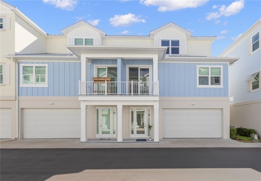 One or more photo(s) has been virtually staged. Luxury living in Downtown Dunedin can be yours today! This beautiful new townhome, built in 2023, is walkable to all the shops, restaurants, and scenery that downtown has to offer. It is the perfect home for owning a golf cart, as you have many places to drive it, and an oversized, tandem, 4-car garage for storing it. The finishes inside are stunning. Engineered hardwood flooring runs throughout the entire home, giving an updated and cohesive look. The ground level consists of your garage, back covered patio, entry, and large storage closet under the stairs. There is also an ELEVATOR that goes to all levels of the home for ease and convenience. The second floor is your main living area and is sure to impress. The large, open kitchen features 42” cabinets, quartz countertops, a marble backsplash, stainless steel appliances, a large apron sink, a grand island, custom lighting, and a pantry with room to spare. You’ll also find that there are high ceilings throughout and plenty of natural light, making it feel even more spacious and airy. On the second floor there is also a full bathroom, a bedroom, and a sizable laundry room with a utility sink. The top floor is where you’ll find the primary suite, third bedroom, and third full bathroom. The primary ensuite is designed with marble and stone-look tile for a spa feel, quartz counters, a large vanity with ample storage, double sinks, a walk-in shower, and a water closet. It also has a great walk-in closet with space for both partners! Other special touches include custom feature walls, high end hardware on all cabinets, chic and unique new bathroom fixtures, and sophisticated picture lights and sconces. The home’s construction really makes it stand out from other new construction homes in the area. These townhomes are built with insulated concrete forms (ICF), meaning this home is extra sturdy, wind resistant, termite and pest resistant, mold resistant, and sound insulated. Other notable features include energy efficient, impact windows and sliding doors, a metal roof, resource efficient appliances, and NATURAL GAS, saving you big money on your power bill. The community HOA fees are low at only $265 per month. Coming soon – a brand-new community POOL! Construction is starting the week of 10/6. This exclusive community of only 32 townhomes is just a short walk to downtown and the Pinellas Trail. A quick trip to the Dunedin Causeway, Honeymoon Island, local parks, and Clearwater Beach. Come see this standout home today!