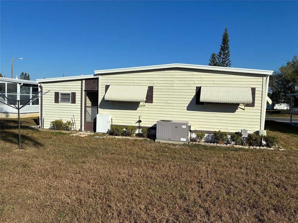 Photo of 3211 Lanark Drive, Holiday, FL 34690 (MLS # W7881063)