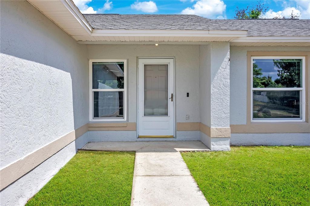 Photo of 10652 Crescendo Loop, Clermont, FL 34711 (MLS # O6408223)