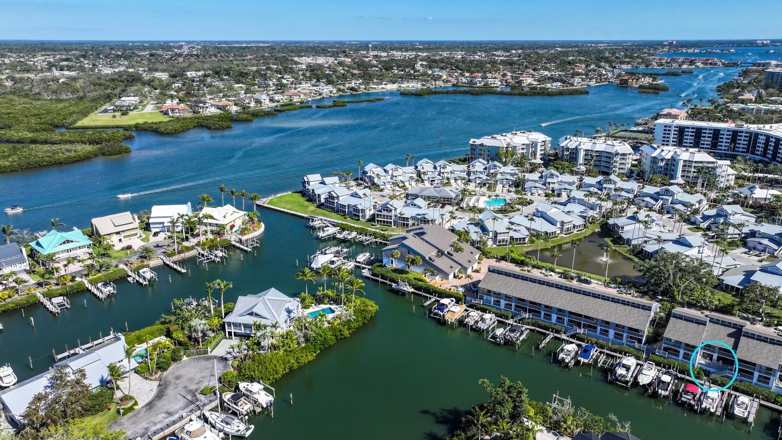 A BOATER'S PARADISE! THE BEST OF THE BEACH AND THE BAY!! Great canal front first floor condo with large deck! Best of both worlds - across the street from Siesta Beach and a gated bayside community open to the intracoastal. Large kitchen with granite countertops, open to living/dining room. Bonus Florida room with plantation shuttered sliders that recess for an open air concept. Two bedroom, each with it’s own bath. Master has a king bed, guest room has two twins. This condo has one of the few large decks with plenty of room for entertaining with a view of the canal. One car attached garage and a guest parking spot right across from the unit, additional parking available by the pool. Active social community with a clubhouse, heated pool and spa, pickleball/tennis courts. Covered area with charcoal grills. Gas grill in garage (owners like to have parking lot happy hours!) or take the free trolley to Siesta Village and enjoy the shops, restaurants, and nightlife!
There is a fishing dock with cleaning station as well as a short term guest boat space. Owner has a deeded boat slip with lift that might be available for an additional fee. Boat slip holds a 25’ boat with motor, lift is 13,000 lbs. Other bigger slips may be available for up to a 40' boat.
**Pricing negotiable depending on length of stay.** In Season $6900.