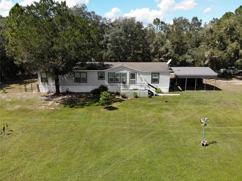 Photo of 7050 SE County Road 337, Morriston, FL 32668 (MLS # OM710219)