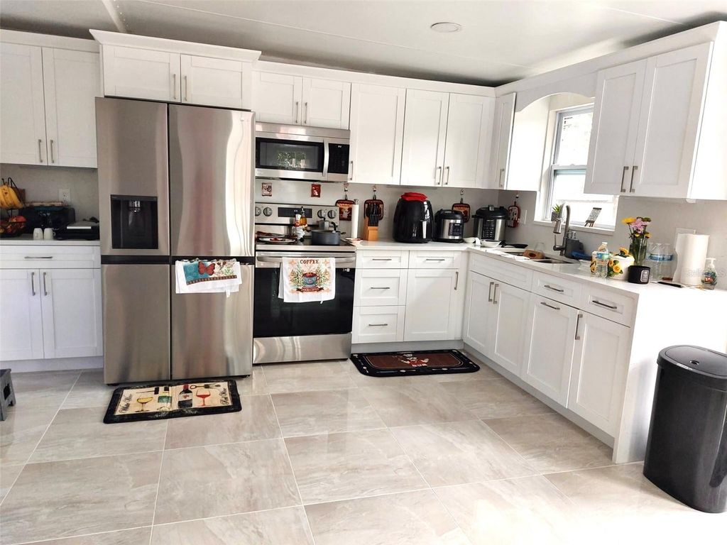 Photo of 2136 W Rambla Street, Tampa, FL 33612 (MLS # TB8476387)