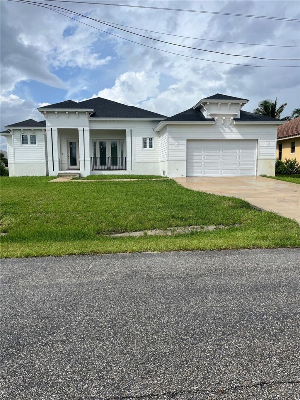 Photo of 14118 Fort Myers Avenue, Port Charlotte, FL 33981 (MLS # L4956081)