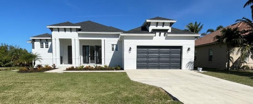 Photo of 14118 Fort Myers Avenue, Port Charlotte, FL 33981 (MLS # L4956081)