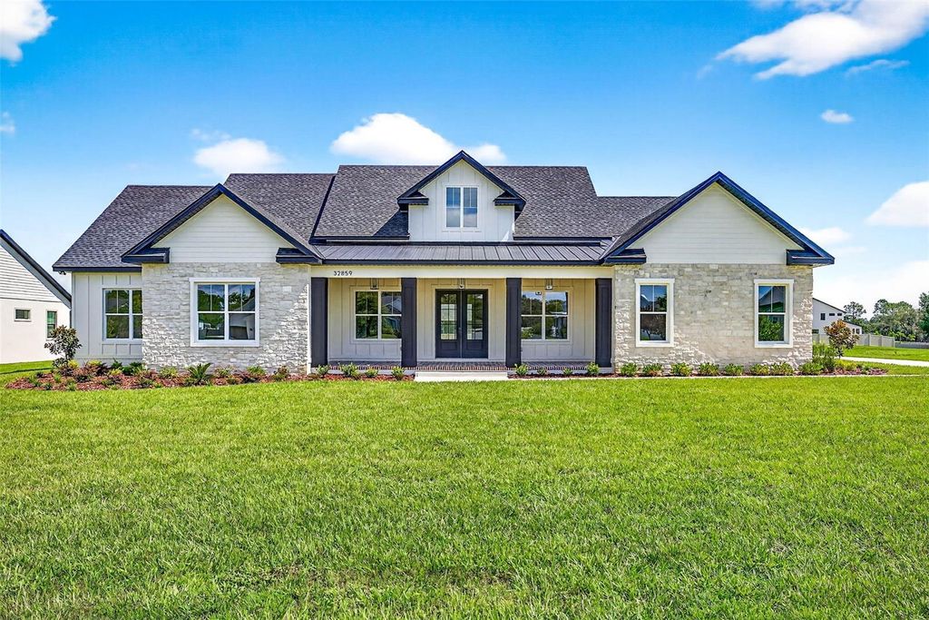 Photo of 32859 3rd Ave, San Antonio, FL 33576 (MLS # TB8416658)